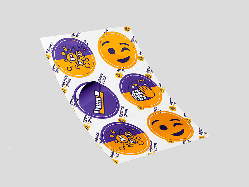 Image d'une planche d'adhésifs rond violet et jaune à poser a soi-même.